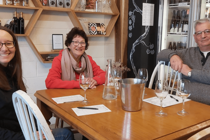 a person sitting at a table in a restaurant