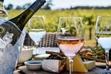 a glass of wine on a table