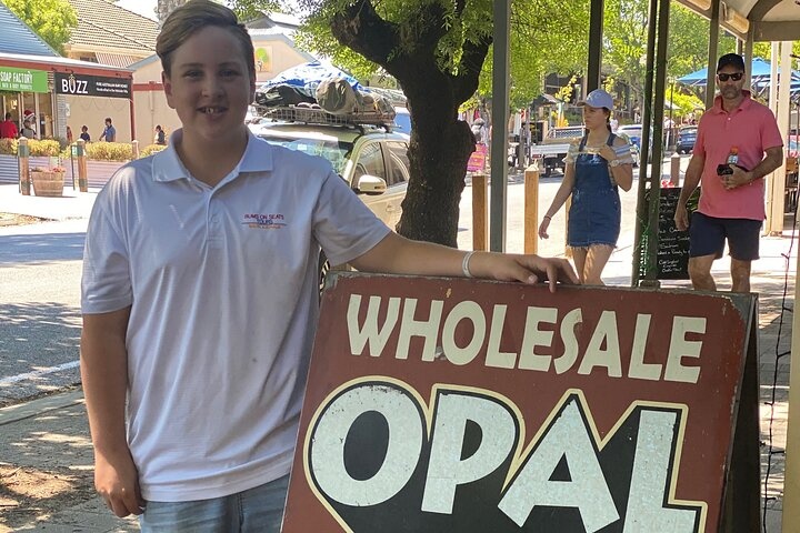 a man holding a sign