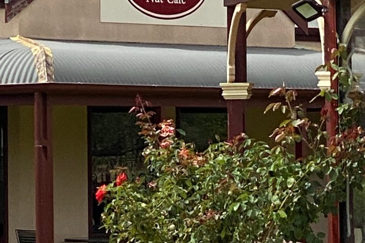 a sign in front of a house