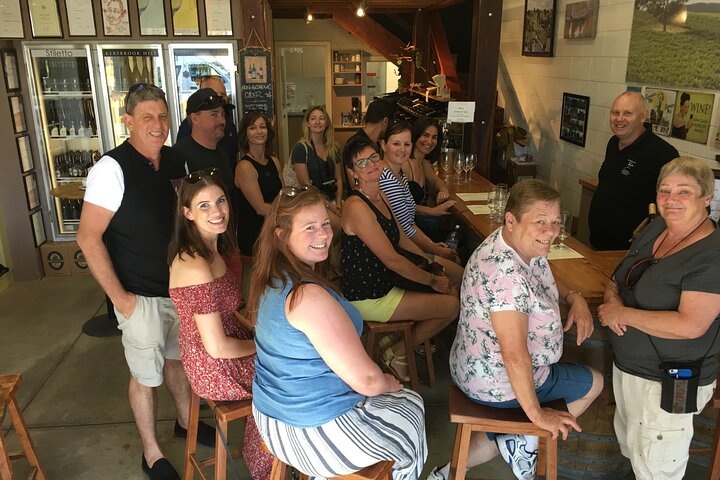 a group of people posing for a photo