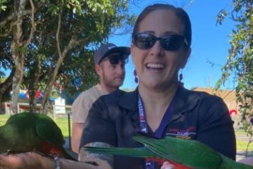 a person holding a bird