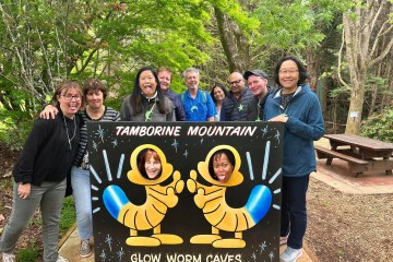 a group of people posing for the camera at Tamborine Mountain Glow Worms