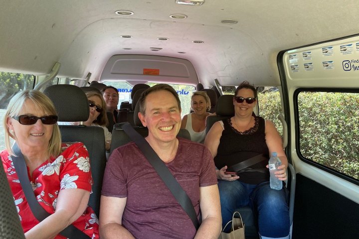 Viktoria Rebensburg et al. sitting on a bus