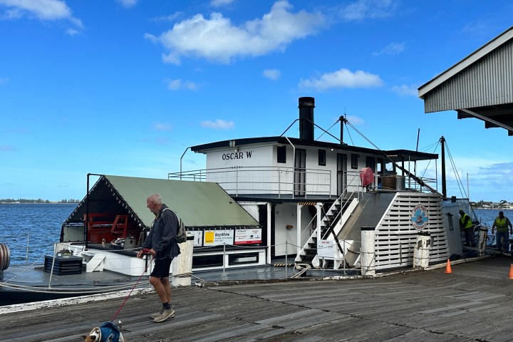 a group of people standing outside of a building