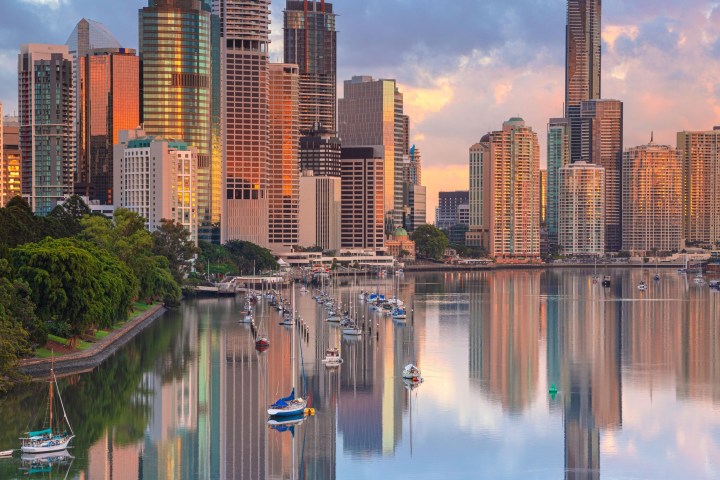 a river with a city in the background