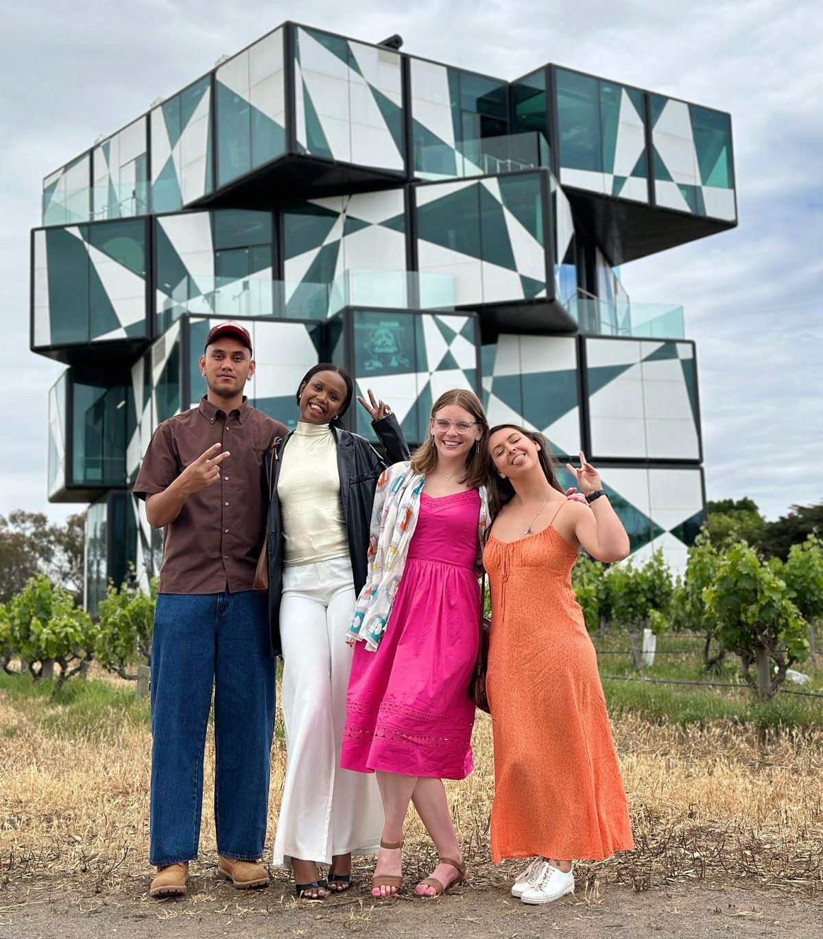 a group of people standing in front of a building