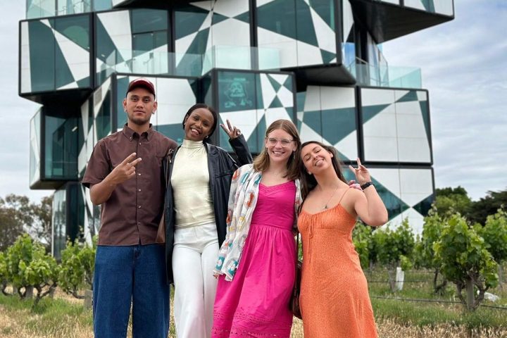 a group of people standing in front of a building